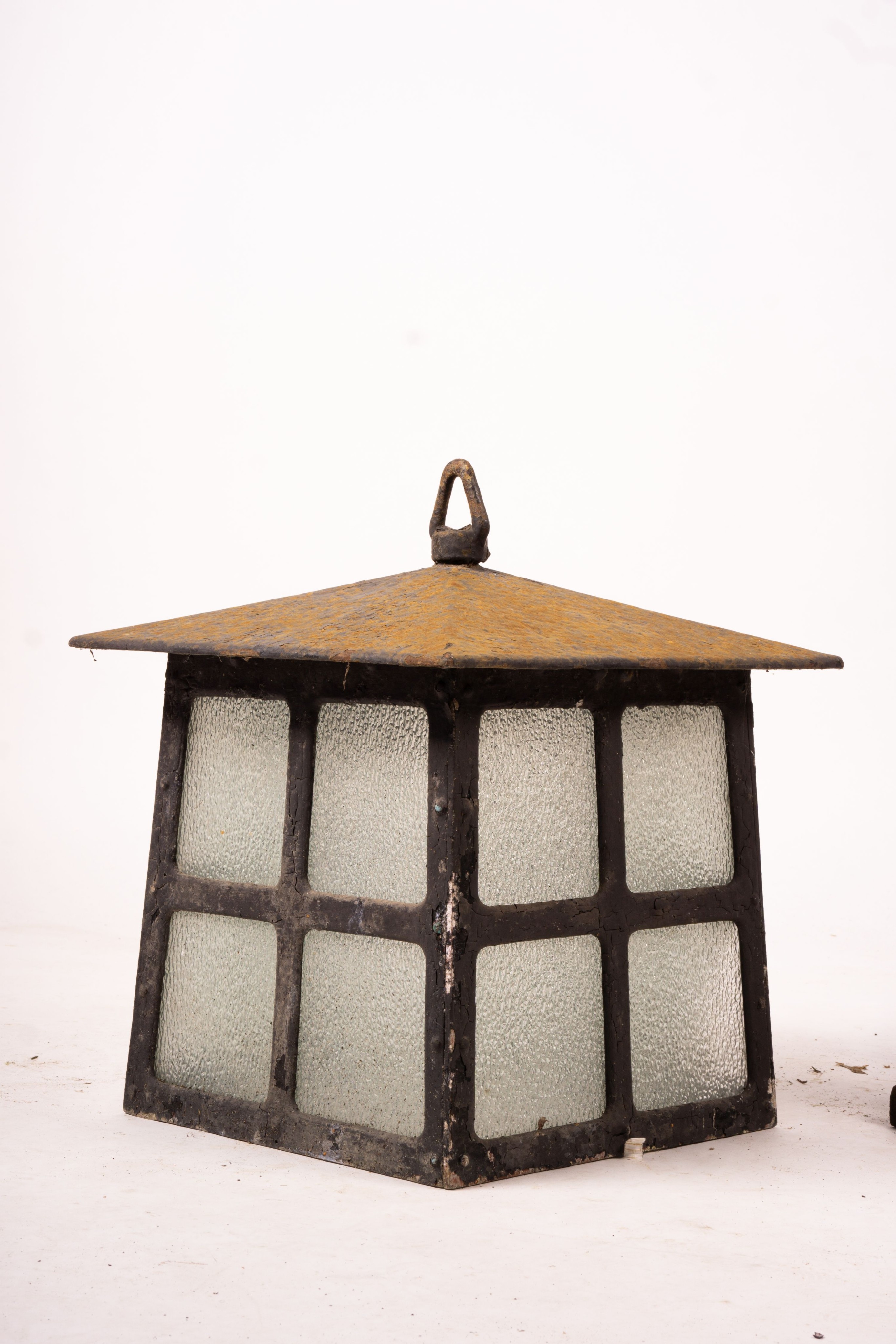 A Victorian style lantern on cast iron base, height 143cm together with a pair of lanterns and a pair of fire dogs